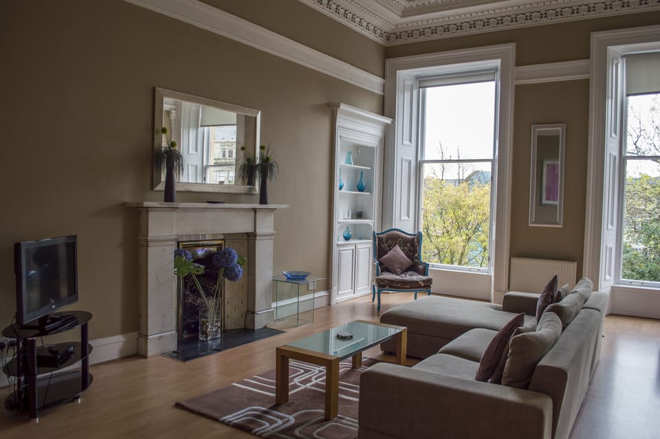 32-inch flat-screen TV with digital channels, LCD TV, DVD player