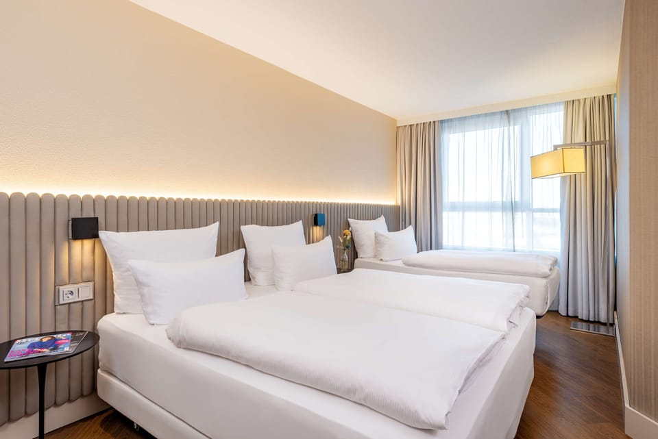 Hypo-allergenic bedding, pillowtop beds, in-room safe, desk