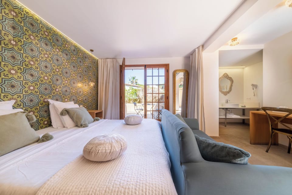 Deluxe Double Room, 1 Queen Bed, Terrace | Minibar, in-room safe, individually decorated, desk