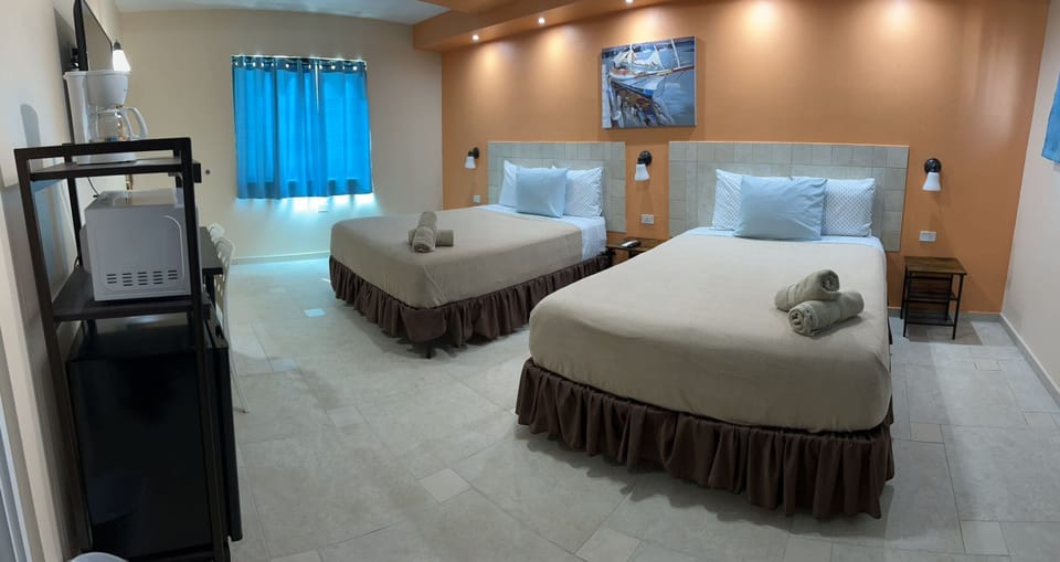 Basic Room, 2 Queen Beds | Desk, free WiFi, bed sheets