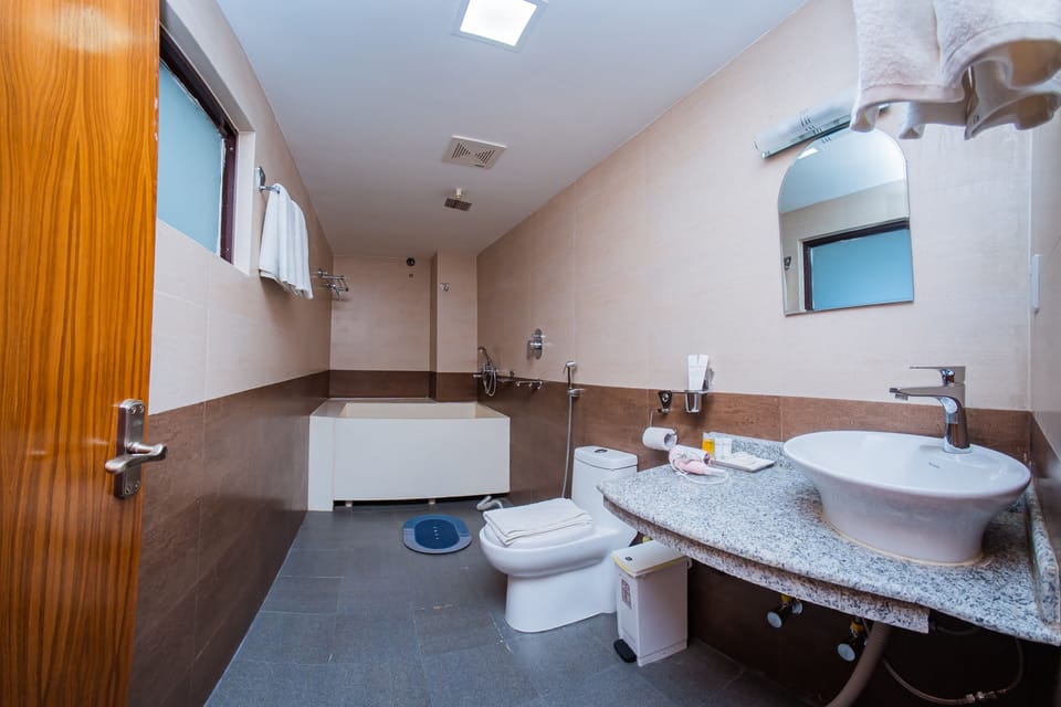 Standard Suite, Lake View | Down comforters, in-room safe, individually furnished, desk