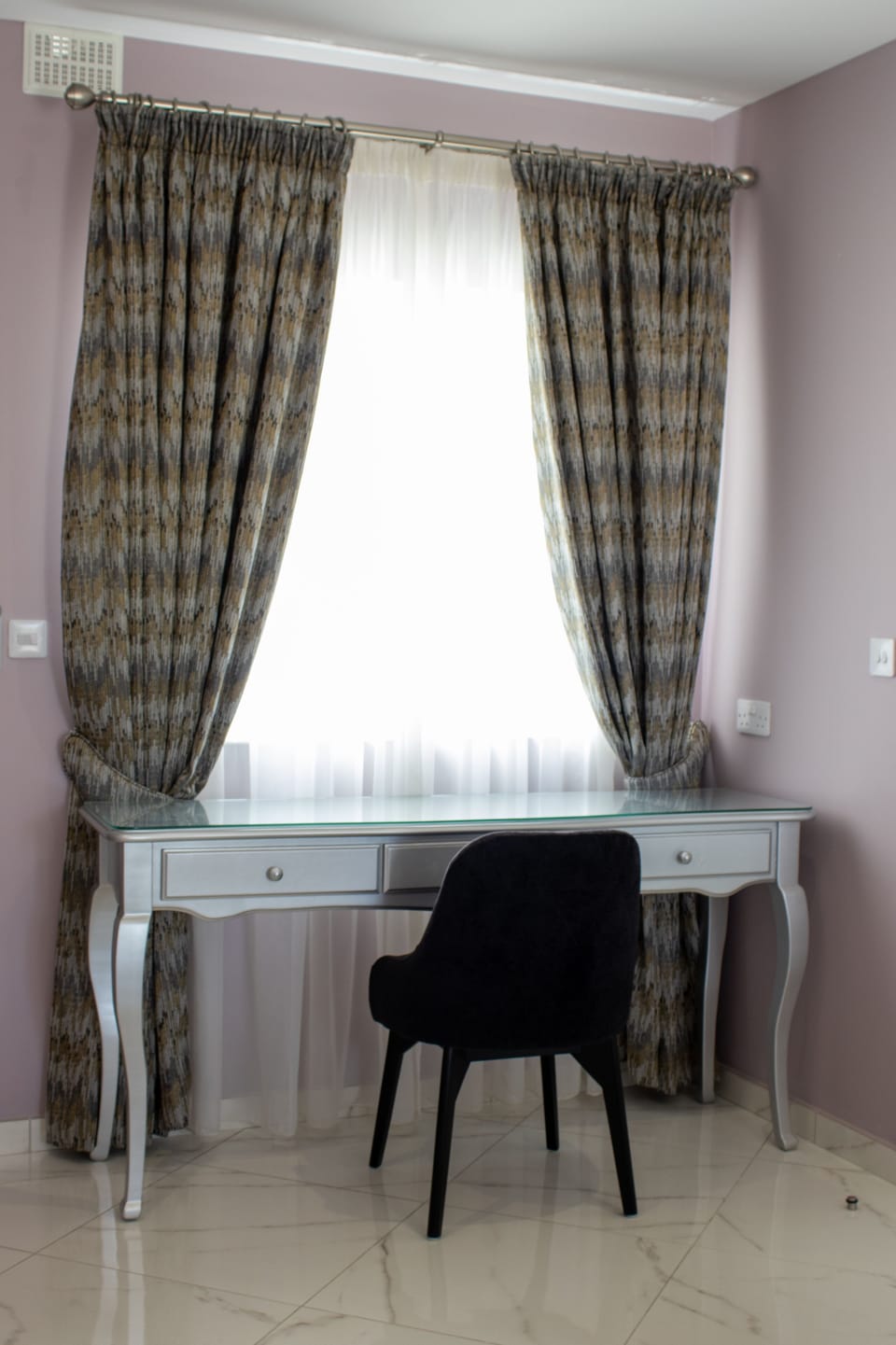 Individually decorated, individually furnished, desk, laptop workspace