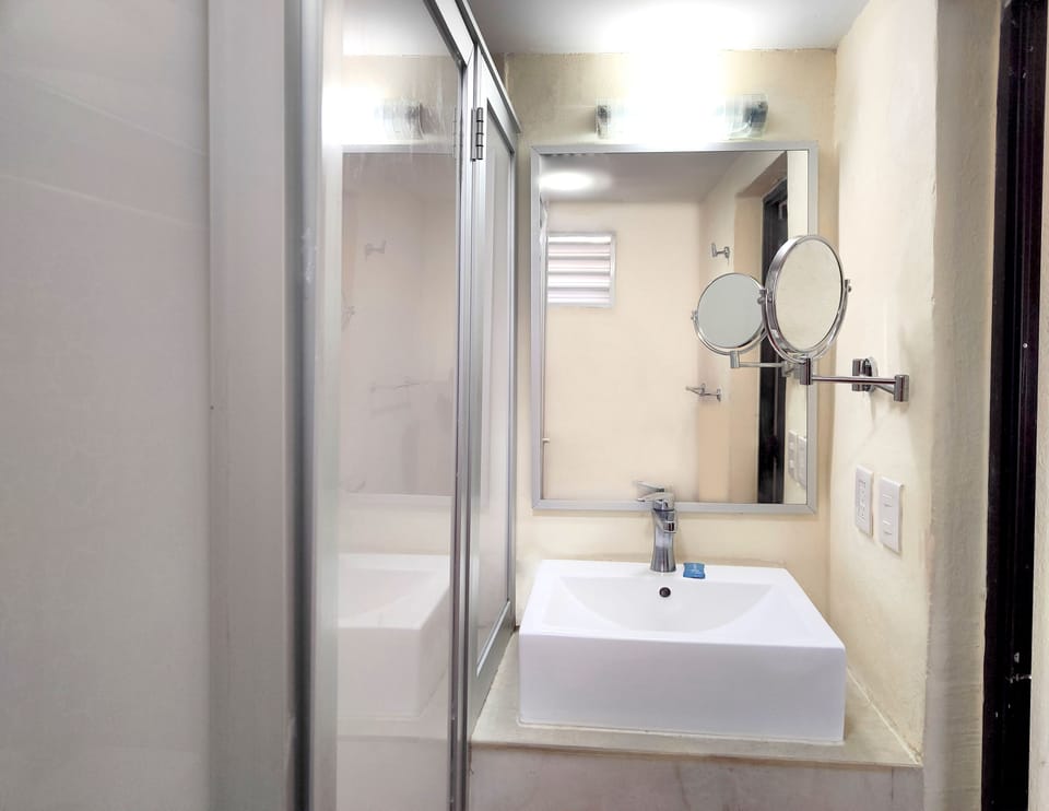 Family Room, City View | Bathroom | Shower, free toiletries, towels, soap