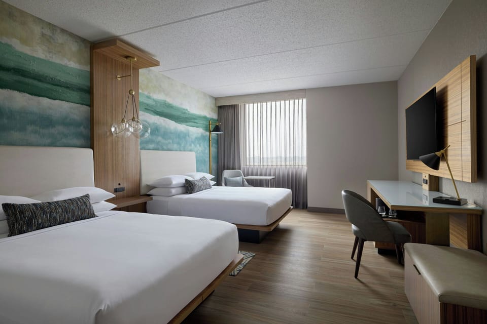 Premium bedding, down comforters, pillowtop beds, in-room safe