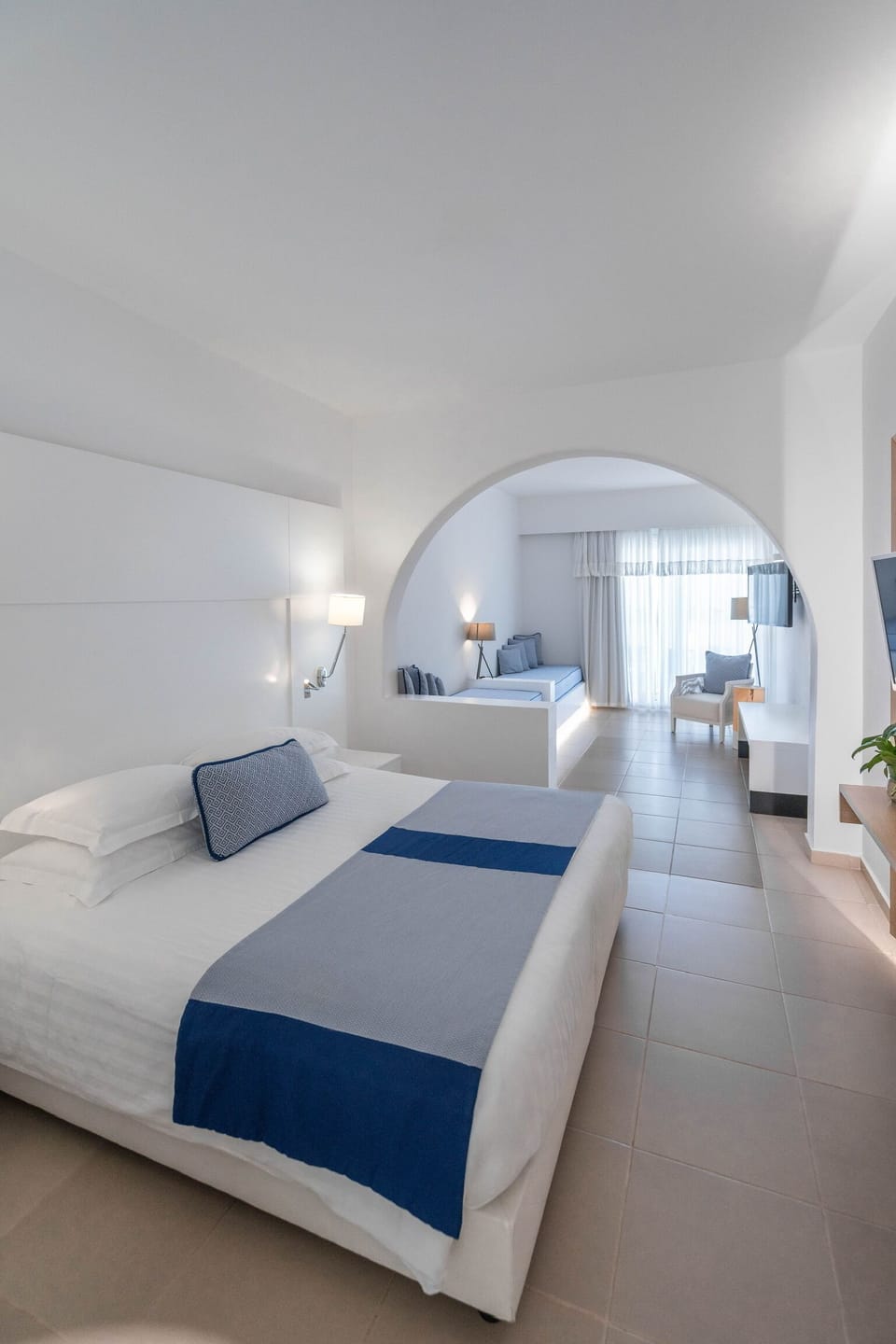 Junior Quadruple Room, Pool View (Shared Swimming Pool) | Premium bedding, in-room safe, individually decorated