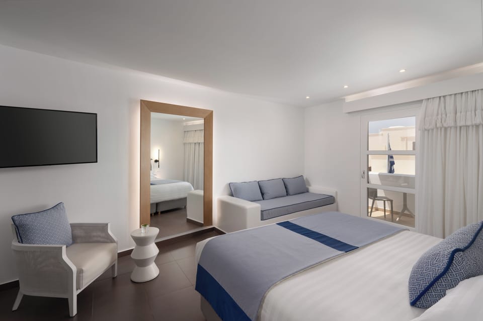 Premium Triple Room, 1 Bedroom, Courtyard View | Premium bedding, in-room safe, individually decorated