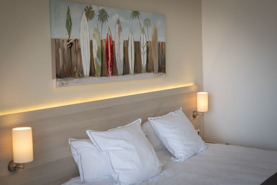 Comfort Room, 1 Queen Bed (Twin bed on request) | Minibar, in-room safe, desk, blackout drapes