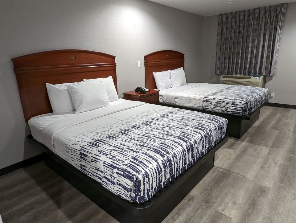 Desk, blackout drapes, free WiFi, bed sheets