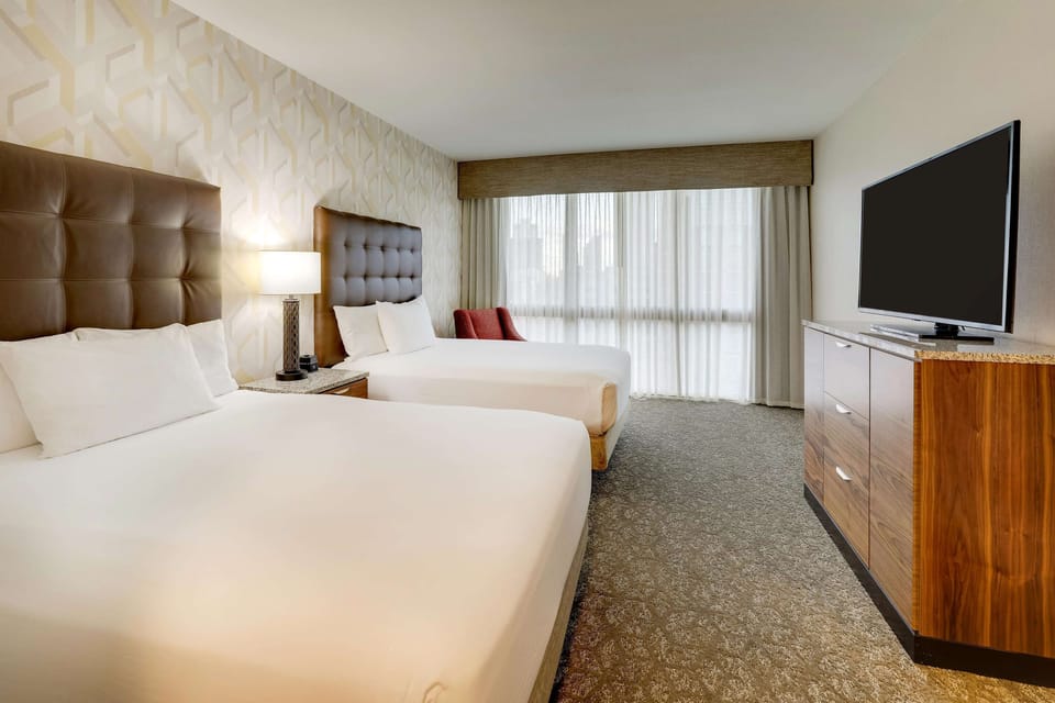 Pillowtop beds, desk, laptop workspace, blackout drapes