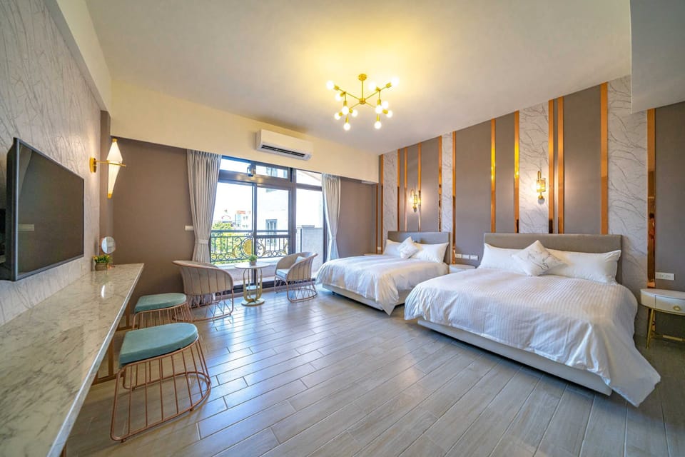 Deluxe Quadruple Room, Balcony | Minibar, individually decorated, soundproofing, free WiFi