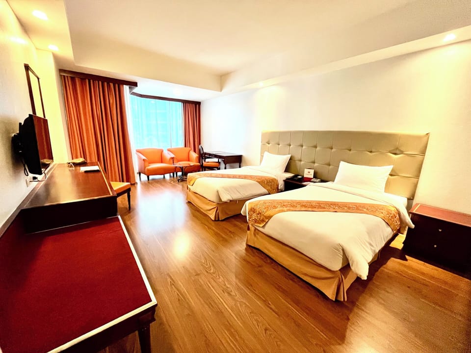 Superior Room | Minibar, in-room safe, desk, iron/ironing board