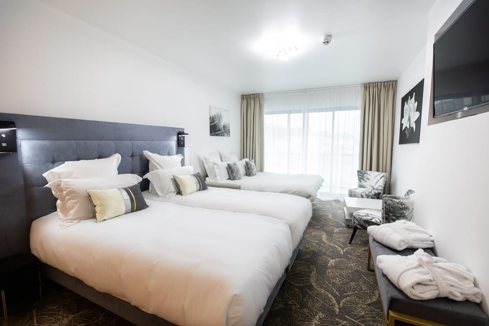 Twin Superior Room with Balcony - Pond View | Premium bedding, in-room safe, individually furnished, desk