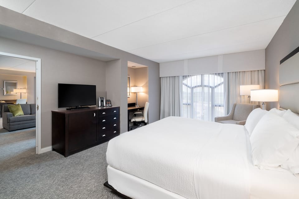 Hypo-allergenic bedding, desk, blackout drapes, iron/ironing board