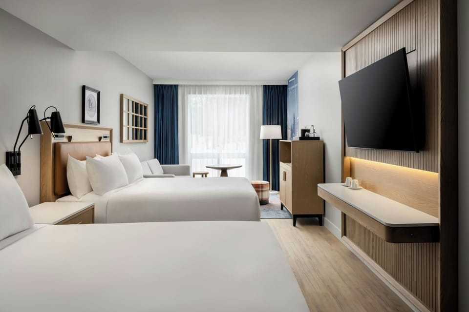 Room, 2 Queen Beds, Garden View | In-room safe, desk, laptop workspace, blackout drapes