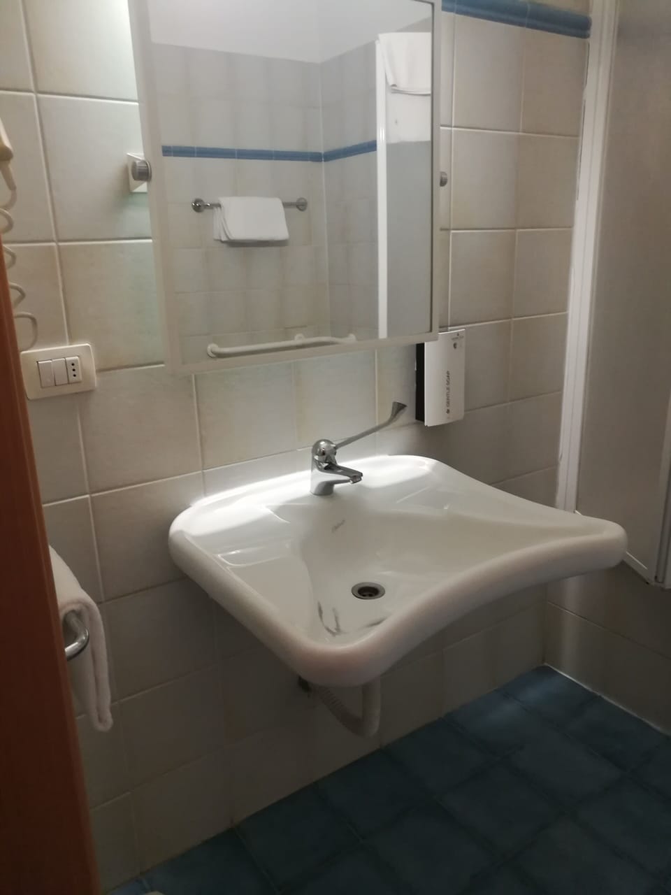 Eco-friendly toiletries, hair dryer, towels