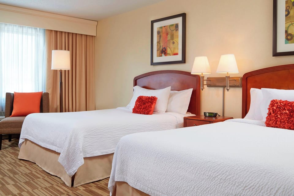 Pillowtop beds, desk, laptop workspace, blackout drapes