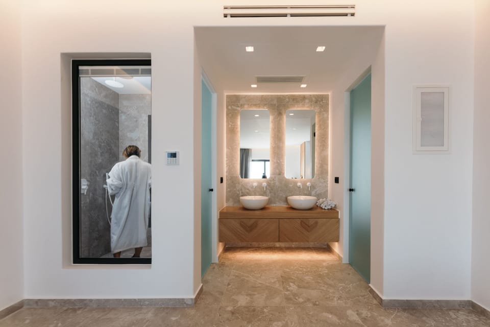 Separate tub and shower, hair dryer, bathrobes, towels