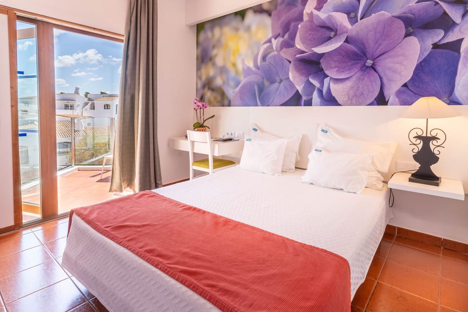 Minibar, in-room safe, blackout drapes, free WiFi