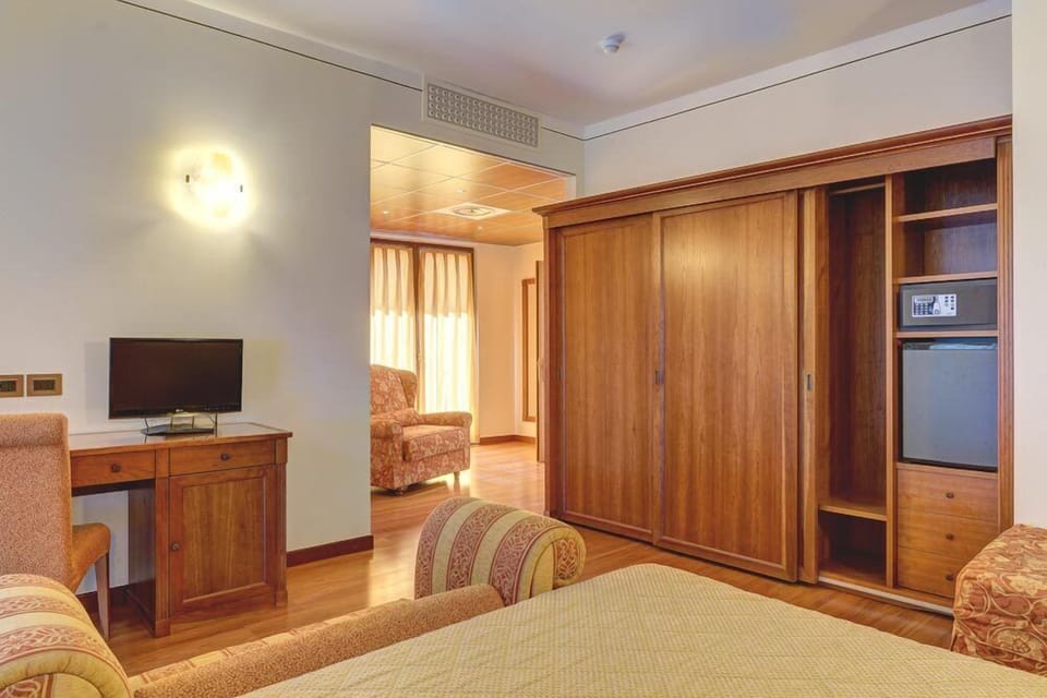 Family Room, Balcony | Select Comfort beds, soundproofing, WiFi (free), bed sheets