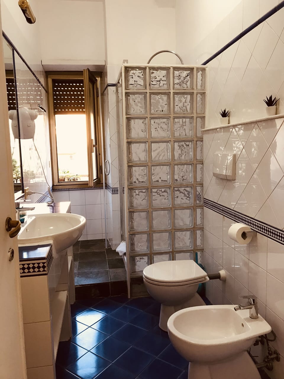 Standard Triple Room | Bathroom | Combined shower/tub, free toiletries, hair dryer, slippers