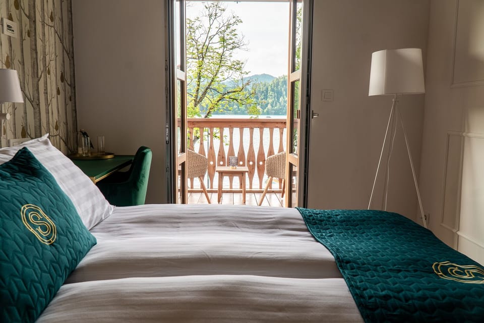 Romantic Double Room, Balcony, Lake View | Minibar, desk, laptop workspace, cribs/infant beds