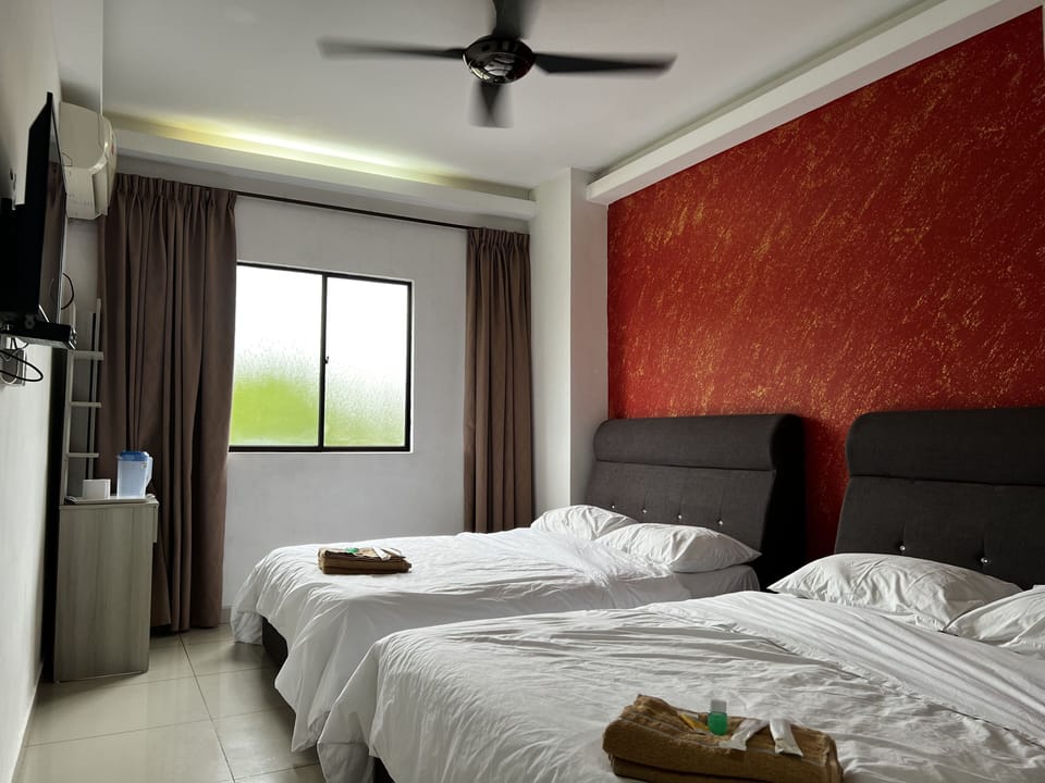 Deluxe Quadruple Room | Free WiFi, bed sheets