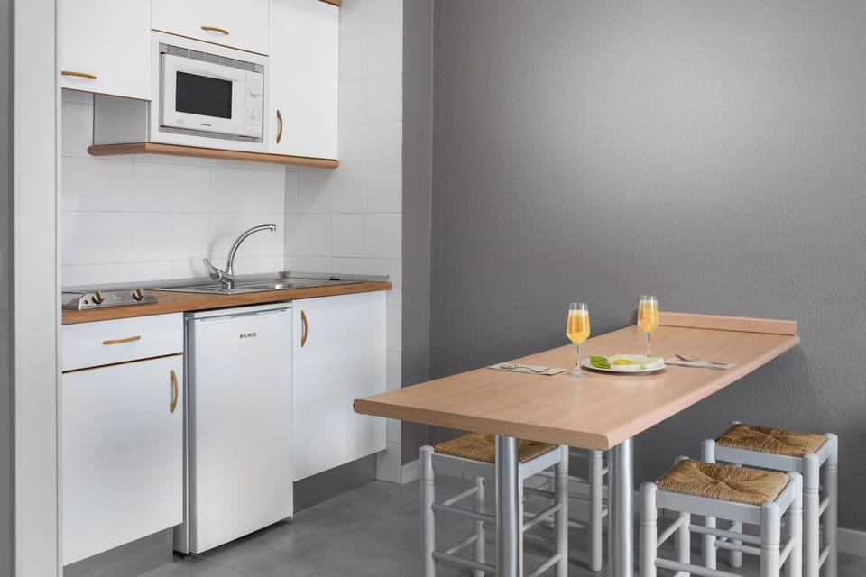 Fridge, microwave, cookware/dishes/utensils