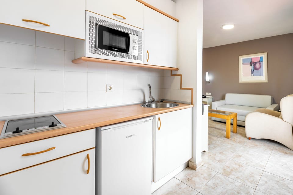 Fridge, microwave, cookware/dishes/utensils