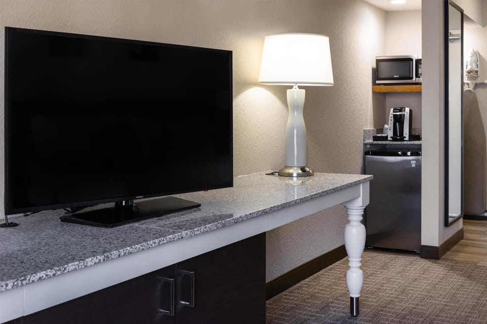 Desk, blackout drapes, iron/ironing board, cribs/infant beds