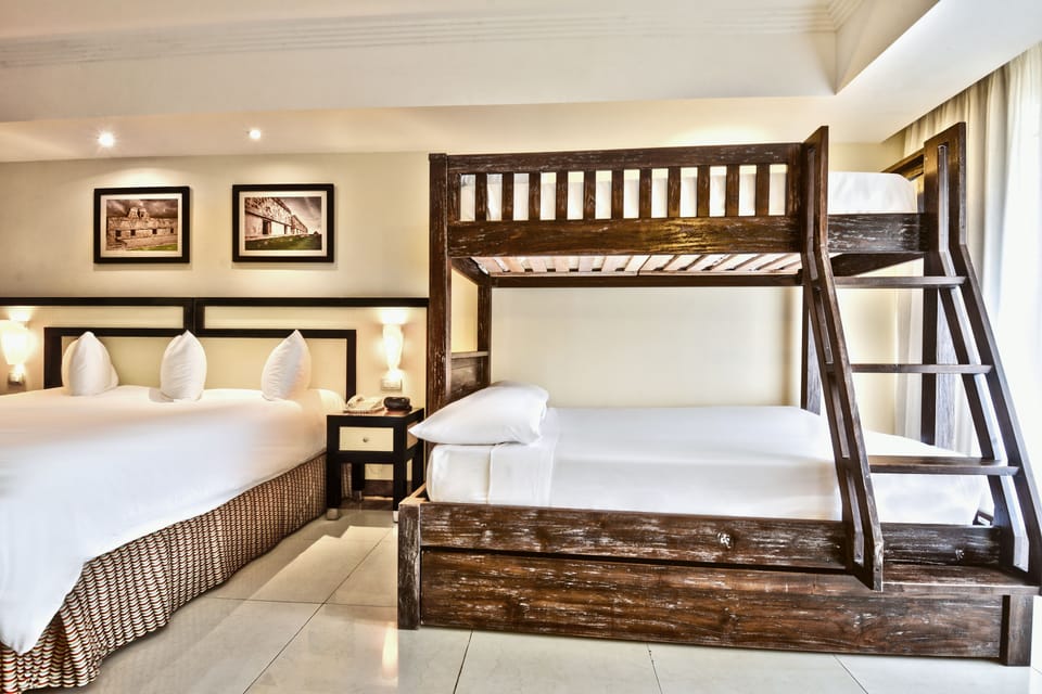 Riviera Family King Junior Suite | Minibar (free items), in-room safe, desk, laptop workspace