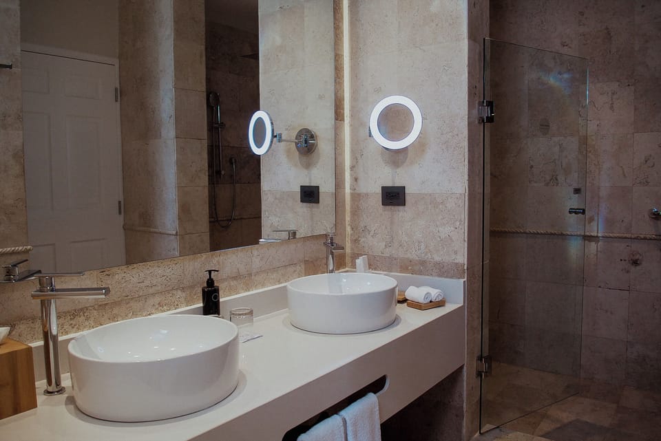Shower, eco-friendly toiletries, hair dryer, bathrobes