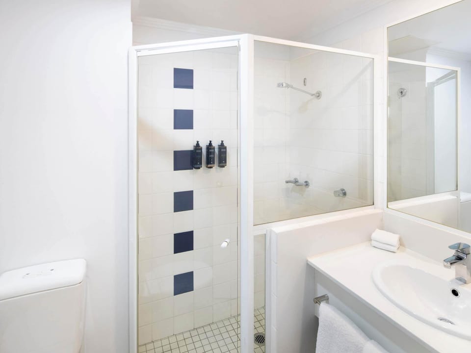 Shower, eco-friendly toiletries, hair dryer, towels