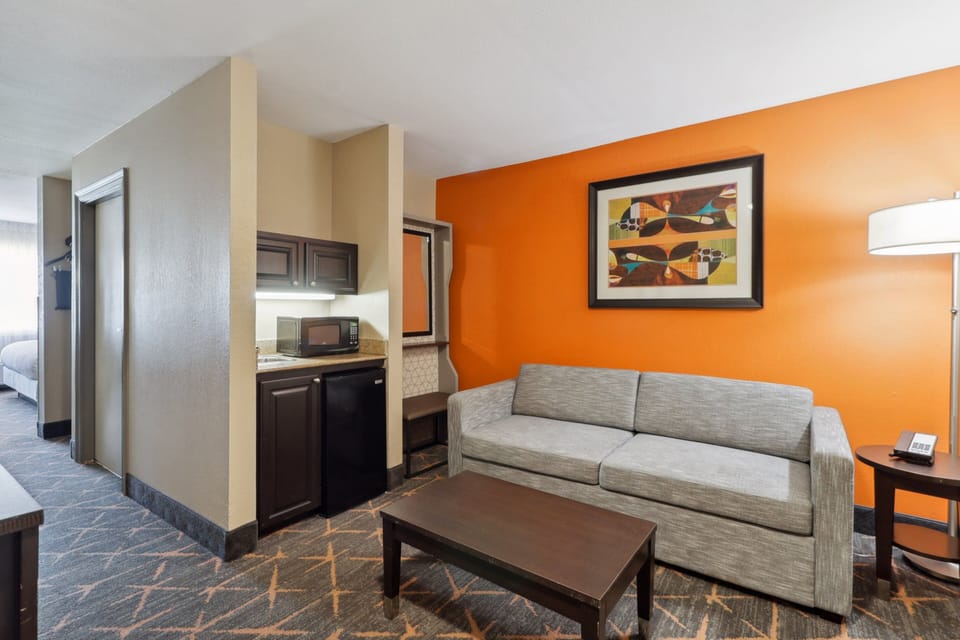 Suite, 1 King Bed with Sofa bed | Pillowtop beds, in-room safe, desk, blackout drapes