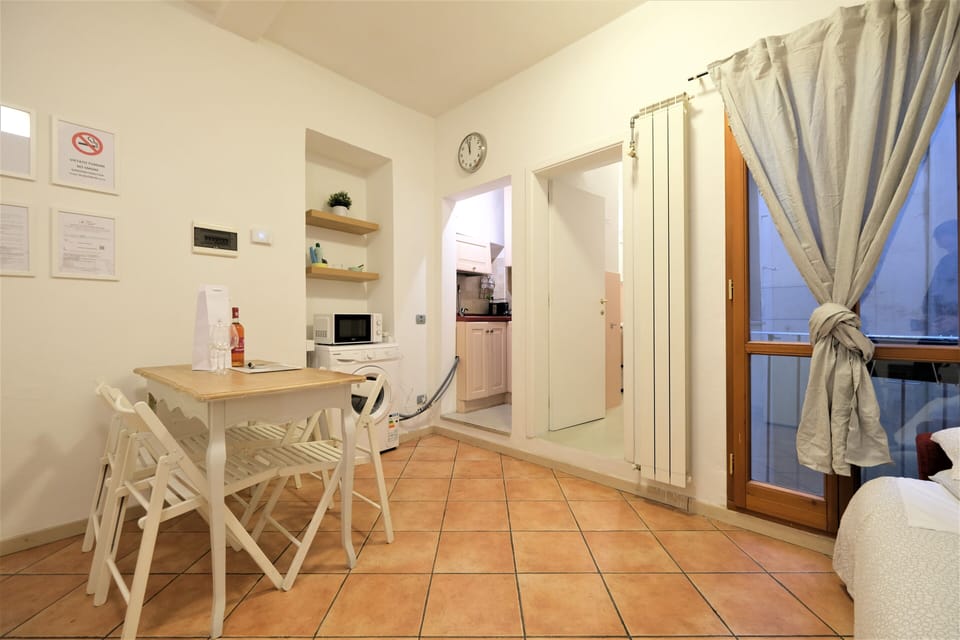 City Apartment | Living area | 100-inch Smart TV with digital channels, TV