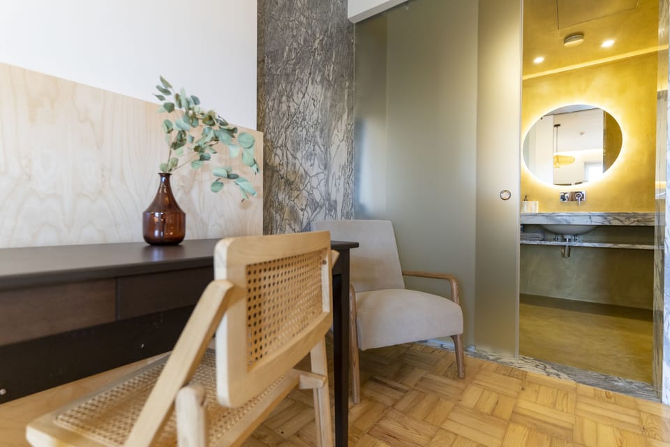 Romantic Studio | Living area | 43-inch flat-screen TV with cable channels, TV
