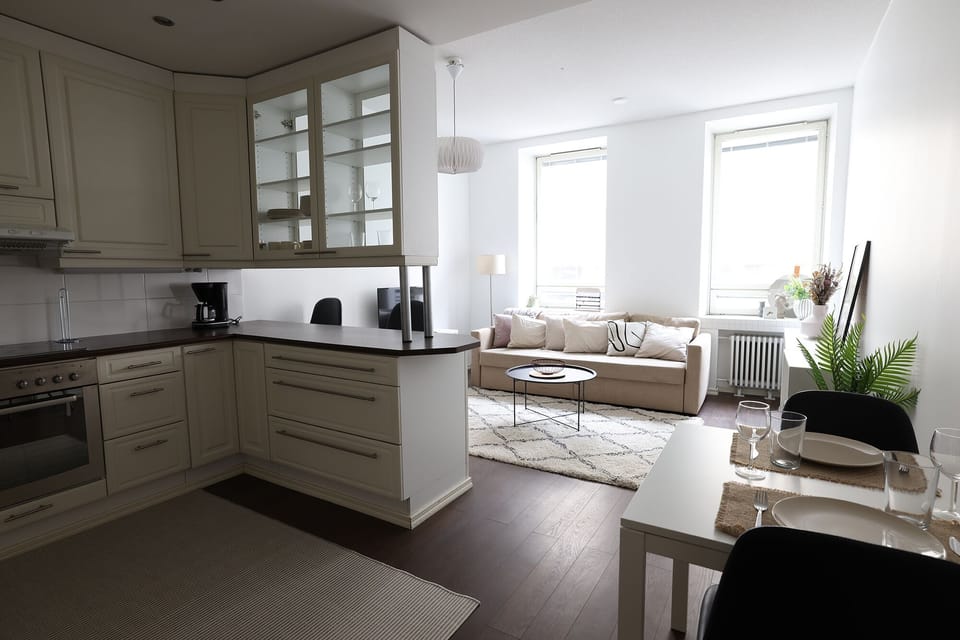 City Apartment | Living area | 36-inch TV with cable channels