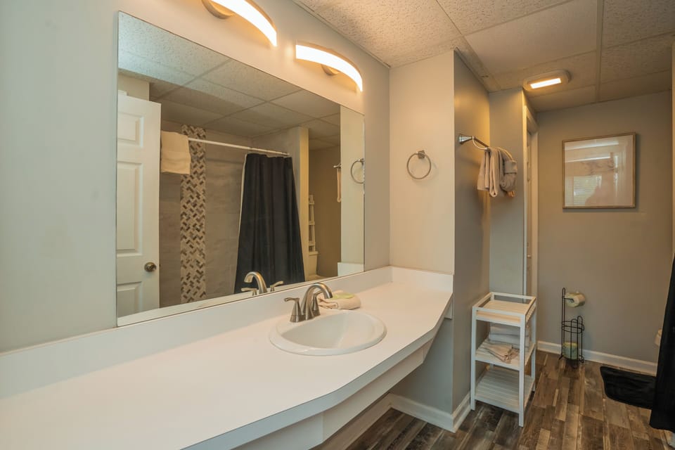 Condo, 2 Bedrooms (103) | Bathroom | Combined shower/tub, free toiletries, towels, soap