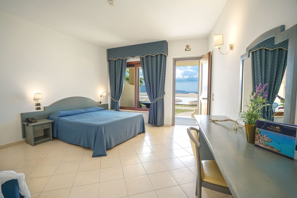 Comfort Double or Twin Room | Minibar, in-room safe, desk, laptop workspace