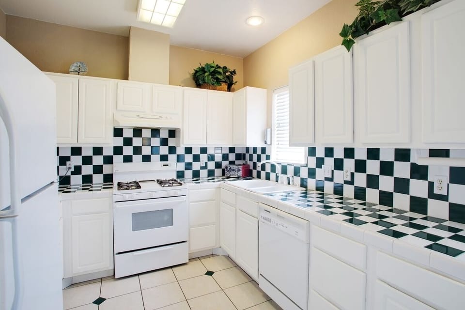 Condo, 2 Bedrooms, 2nd Floor | Private kitchen | Coffee/tea maker, fridge, microwave