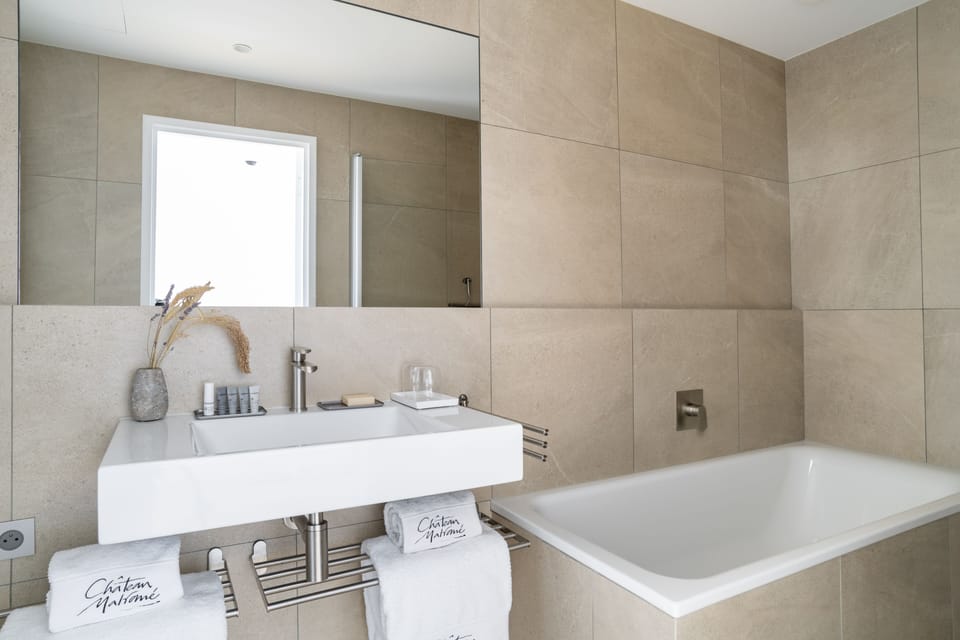Exclusive Double Room | Bathroom | Designer toiletries, hair dryer, bathrobes, slippers