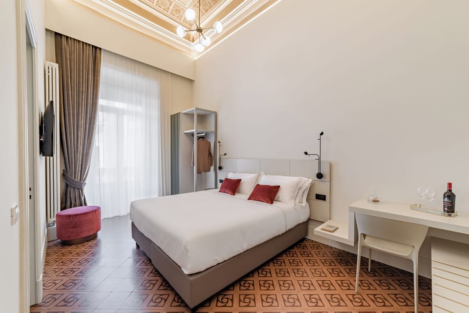 Double or Twin Room | Minibar, in-room safe, individually decorated, individually furnished