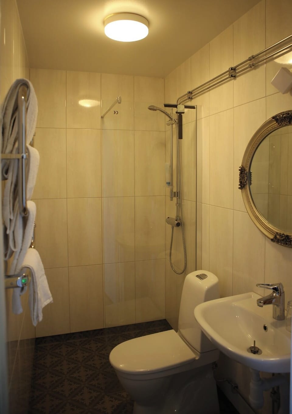 Shower, rainfall showerhead, hair dryer, towels