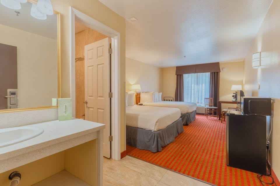Room, 2 Queen Beds | Individually decorated, individually furnished, desk, laptop workspace