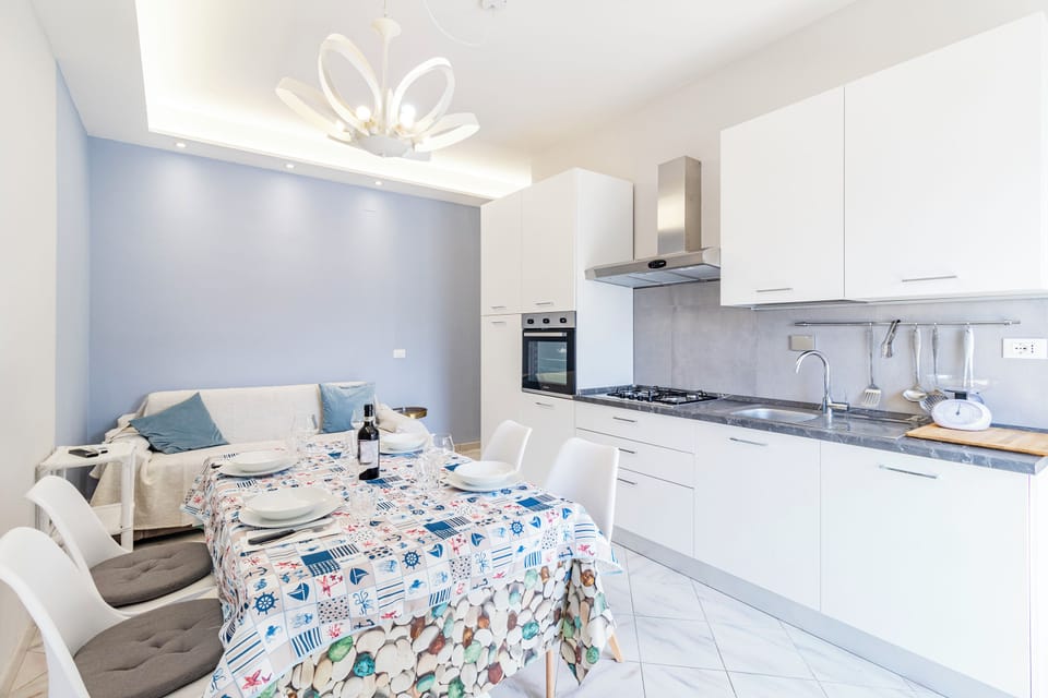 Family Apartment, Multiple Bedrooms (Bedo House Beach Front) | Private kitchen | Fridge, oven, stovetop, dishwasher