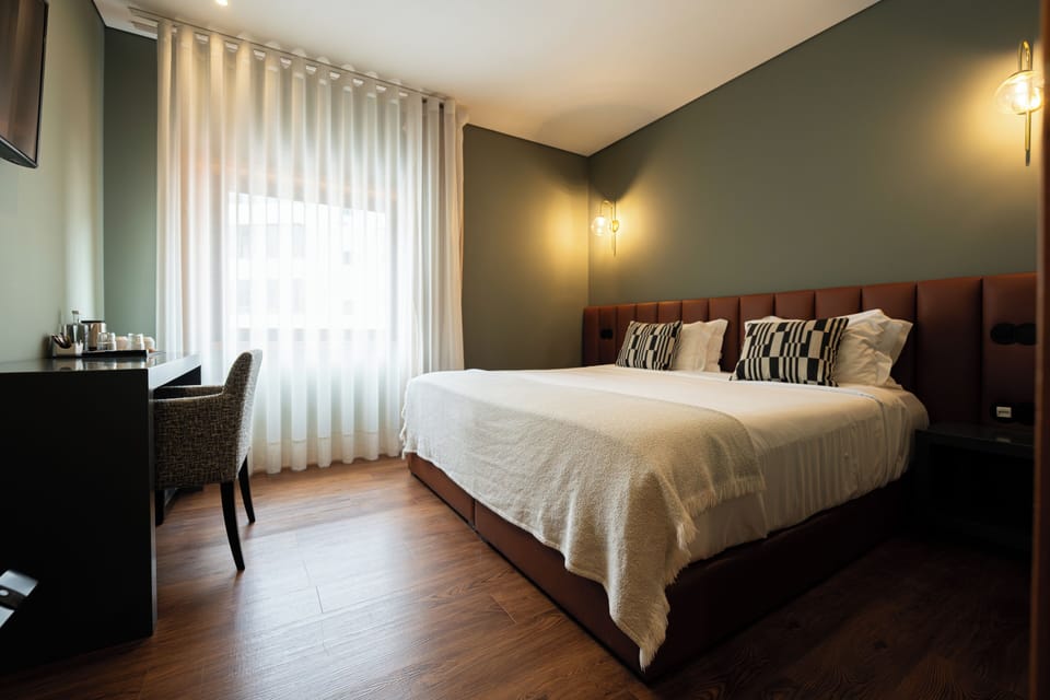 Standard Double or Twin Room | Minibar, desk, laptop workspace, soundproofing