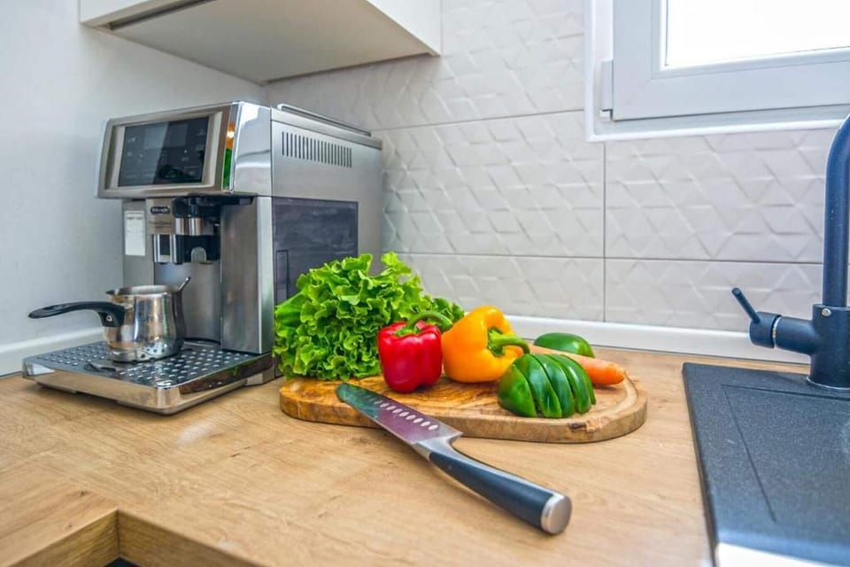 Villa | Private kitchen | Fridge, oven, stovetop, dishwasher