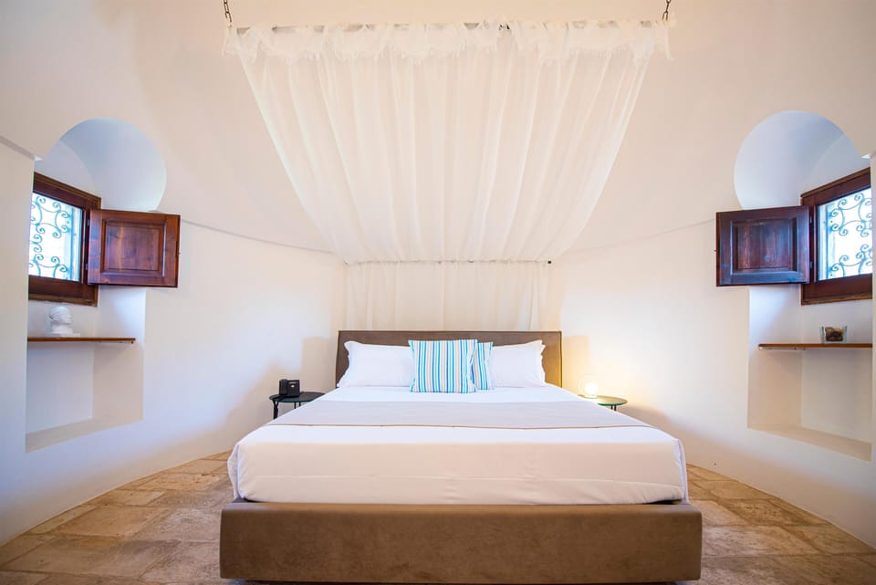 Trullo | Minibar, in-room safe, desk, free cribs/infant beds