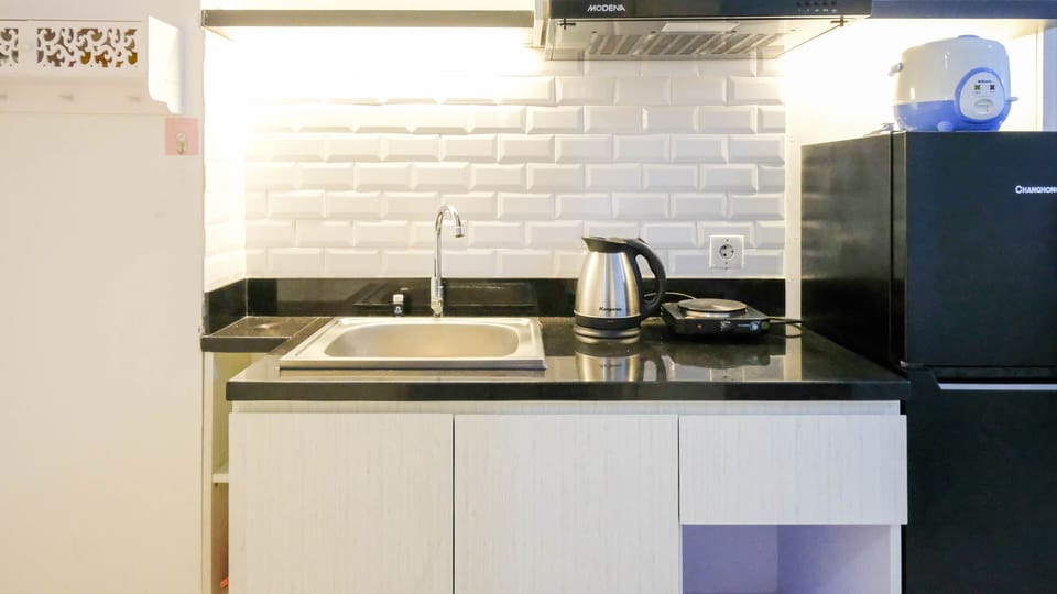 Studio | Private kitchen | Fridge, stovetop, cookware/dishes/utensils, dining tables