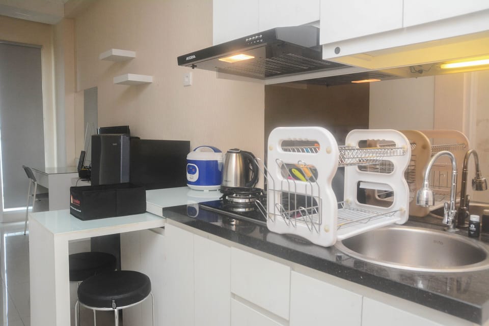 Studio | Private kitchen | Fridge, stovetop, cookware/dishes/utensils, dining tables