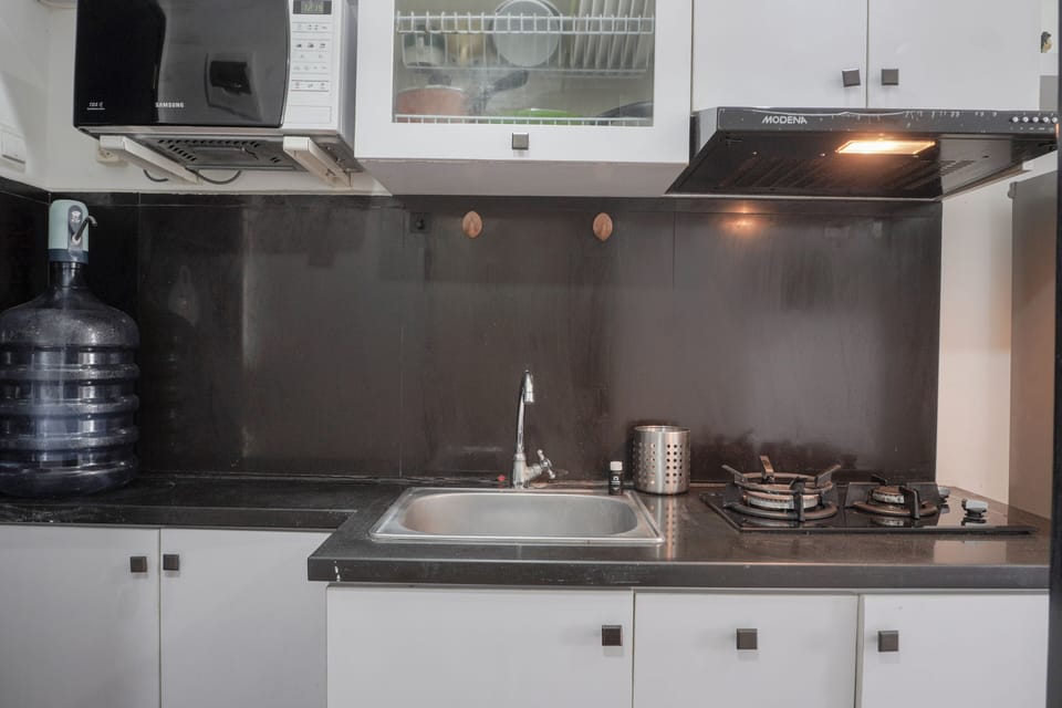 Studio | Private kitchen | Fridge, stovetop, cookware/dishes/utensils, dining tables